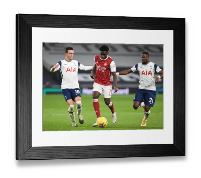 Framed Print : Bukayo Saka Faces Off Against Lo Celso and Aurier in Tottenham vs Arsenal Premier League Clash (December 2020) Framed Print : Bukayo Saka Faces Off Against Lo Celso and Aurier in Tottenham vs Arsenal Premier League Clash (December 2020)