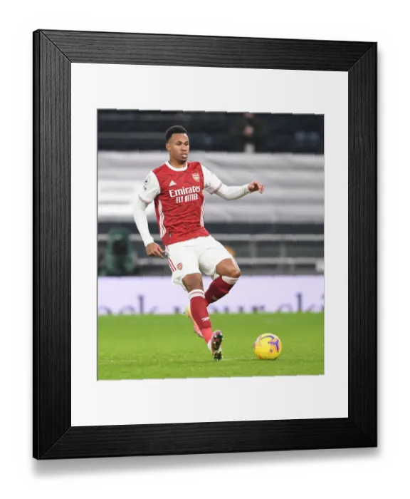 Framed Print : Arsenal's Gabriel Shines in Front of Limited Fans: Arsenal vs. Tottenham Hotspur at Tottenham Hotspur Stadium, Premier League 2020-21