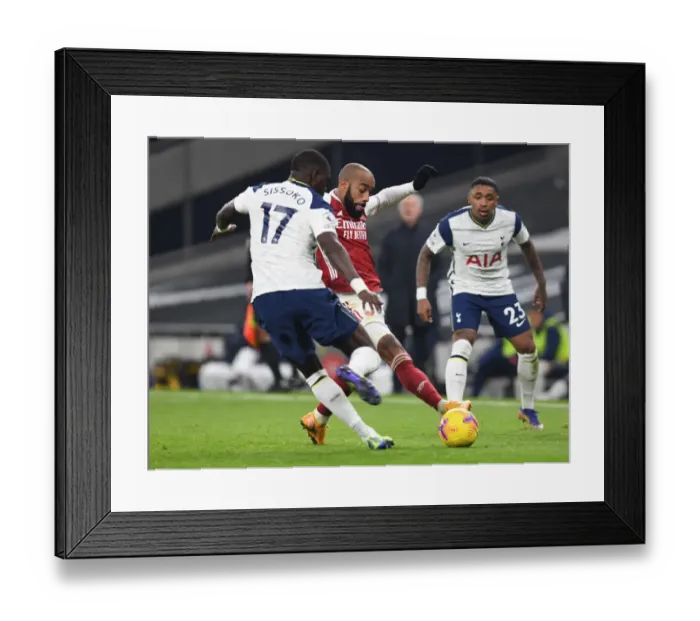Framed Print : London Rivals Clash: Lacazette vs. Sissoko in the 2020-21 Premier League Showdown