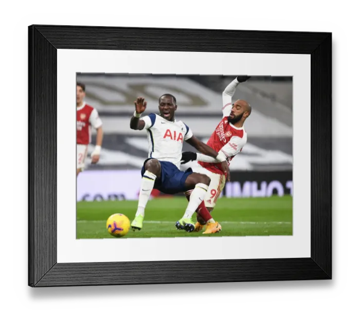 Framed Print : Arsenal's Alex Lacazette Clashes with Tottenham's Moussa Sissoko in the 2020-21 Premier League Showdown