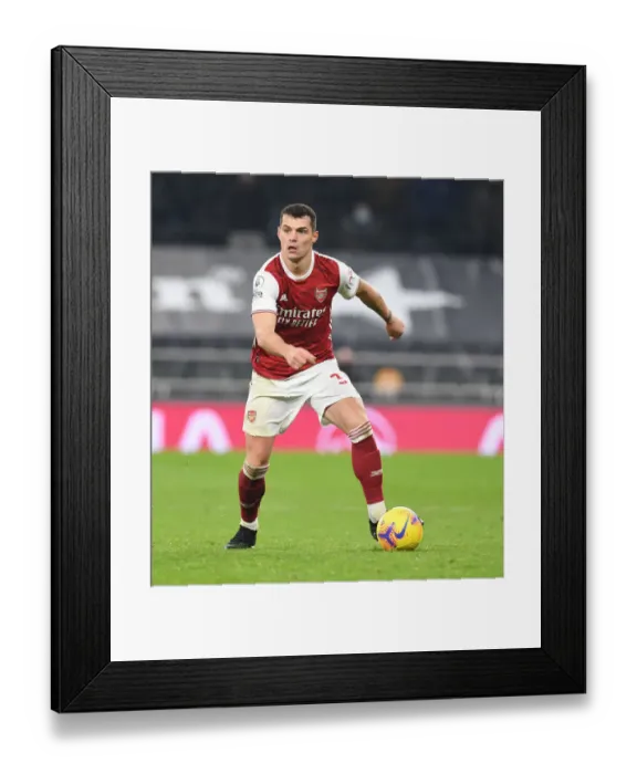 Framed Print : London Derby Showdown: Xhaka's Battle in Arsenal's Premier League Clash Against Tottenham