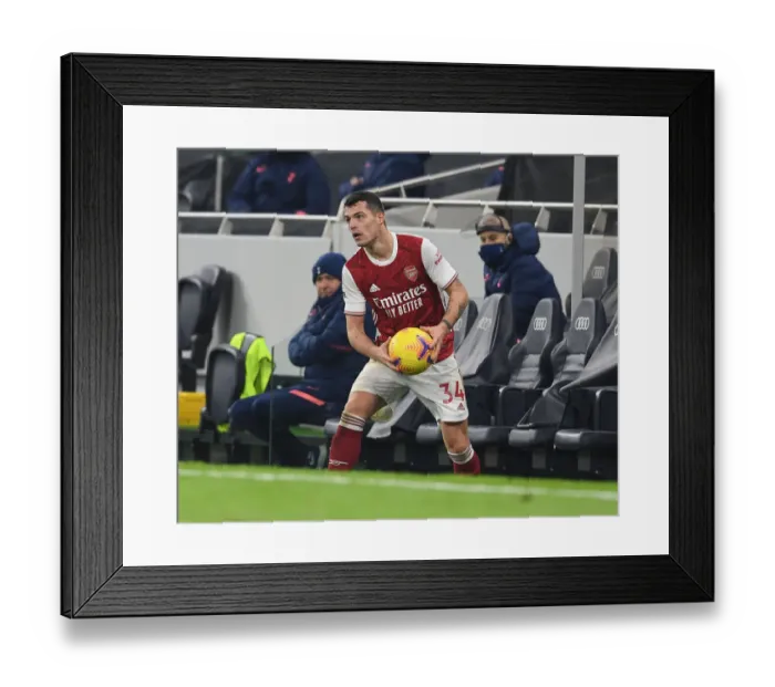 Framed Print : London Derby Showdown: Xhaka's Battle in Arsenal's Premier League Clash vs. Tottenham Hotspur, 2020-21