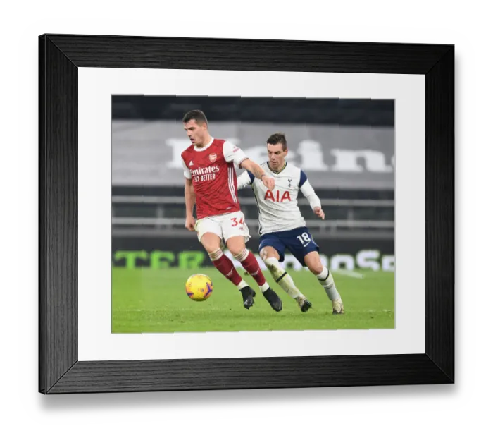 Framed Print : Granit Xhaka Breaks Past Tottenham's Lo Celso in 2020-21 Premier League Clash Framed Print : Granit Xhaka Breaks Past Tottenham's Lo Celso in 2020-21 Premier League Clash