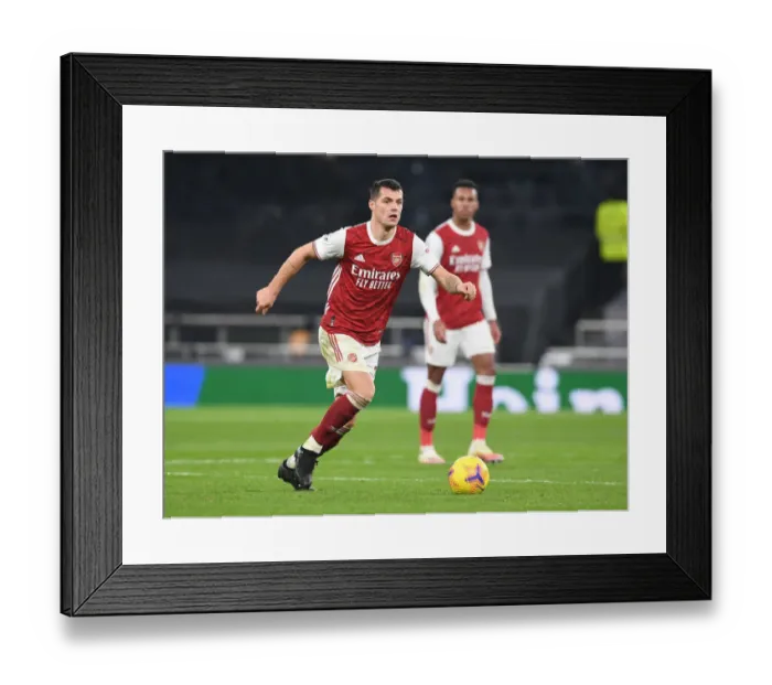 Framed Print : Arsenal's Xhaka in Action: Tottenham vs Arsenal, Premier League 2020-21