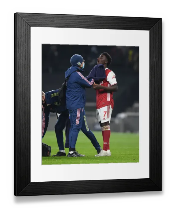 Framed Print : Arsenal's Bukayo Saka Receives Medical Attention During Tottenham Match, 2020-21 Premier League Framed Print : Arsenal's Bukayo Saka Receives Medical Attention During Tottenham Match, 2020-21 Premier League
