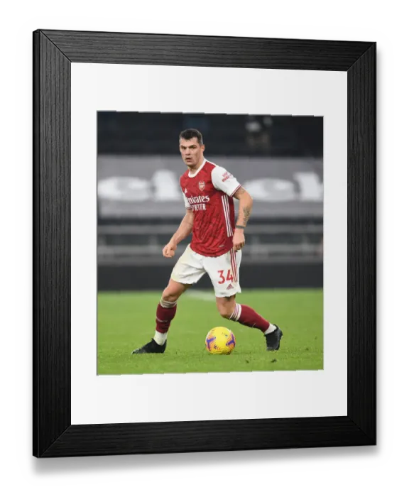 Framed Print : Granit Xhaka of Arsenal in Action at Tottenham Hotspur Stadium during the 2020-21 Premier League Match Framed Print : Granit Xhaka of Arsenal in Action at Tottenham Hotspur Stadium during the 2020-21 Premier League Match
