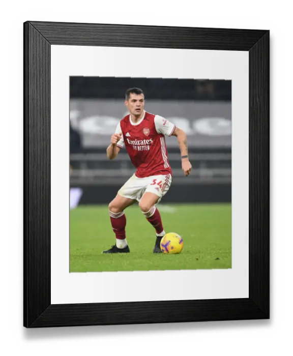 Framed Print : Granit Xhaka in Action: Arsenal vs. Tottenham Hotspur, Premier League 2020-21 Framed Print : Granit Xhaka in Action: Arsenal vs. Tottenham Hotspur, Premier League 2020-21