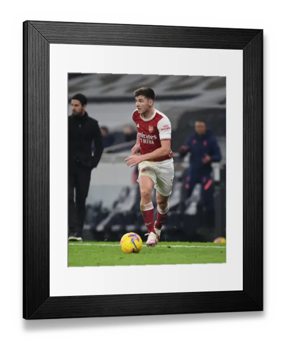 Framed Print : Arsenal's Kieran Tierney Goes Head-to-Head with Tottenham Hotspur in Premier League Battle (December 2020) Framed Print : Arsenal's Kieran Tierney Goes Head-to-Head with Tottenham Hotspur in Premier League Battle (December 2020)