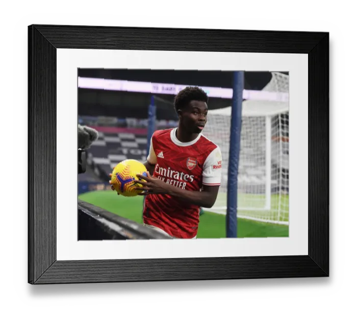 Framed Print : Arsenal's Bukayo Saka in Action against Tottenhotpur in 2020-21 Premier League Framed Print : Arsenal's Bukayo Saka in Action against Tottenhotpur in 2020-21 Premier League