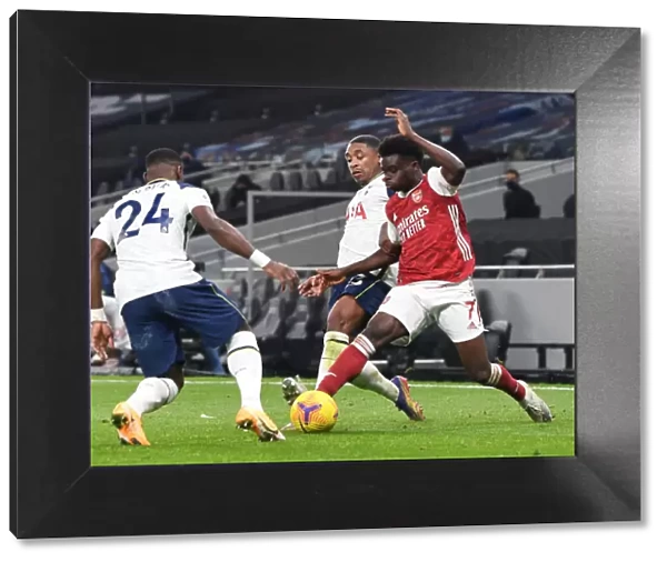 Tottenham vs Arsenal: Bukayo Saka Faces Off Against Bergwijn and Aurier in the Premier League
