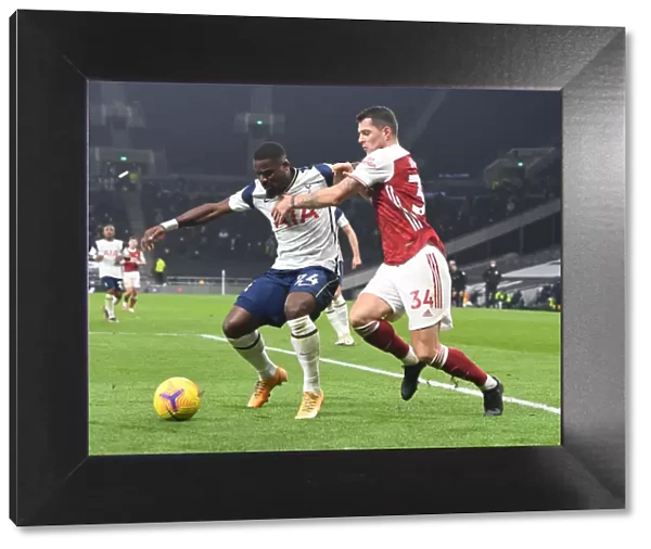 Granit Xhaka vs. Serge Aurier: Clash of the London Rivals in the Premier League