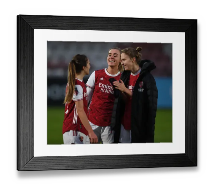 Framed Print : Arsenal Women's Triumph: Evans, Roord, and Miedema Celebrate Victory