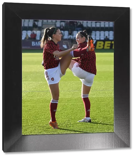 Arsenal Women Prepare for Birmingham City Women Showdown in FA WSL: Katie McCabe and Caitlin Foord Warm Up