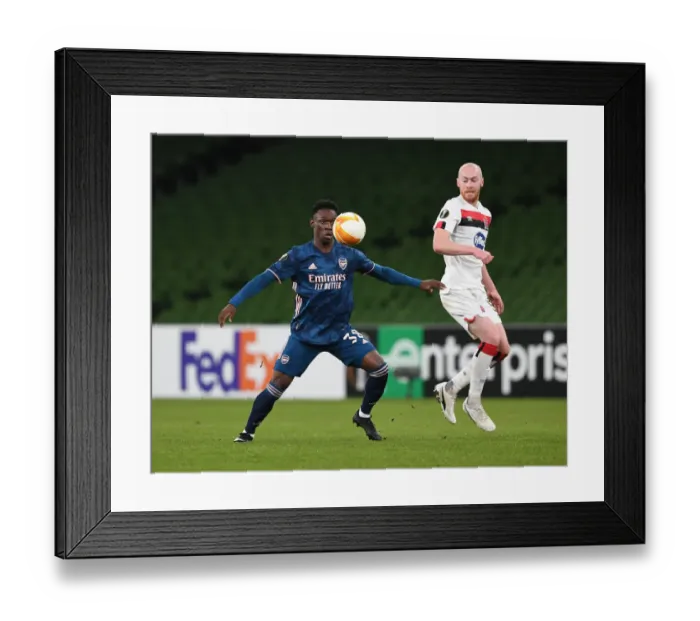 Framed Print : Intense Battle: Balogun vs. Shields in Dundalk vs. Arsenal UEFA Europa League Clash Framed Print : Intense Battle: Balogun vs. Shields in Dundalk vs. Arsenal UEFA Europa League Clash