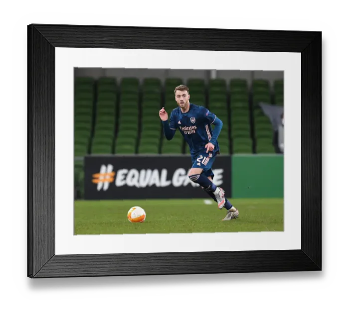 Framed Print : Arsenal's Calum Chambers: A Defensive Star in Europa League Clash Against Dundalk Framed Print : Arsenal's Calum Chambers: A Defensive Star in Europa League Clash Against Dundalk