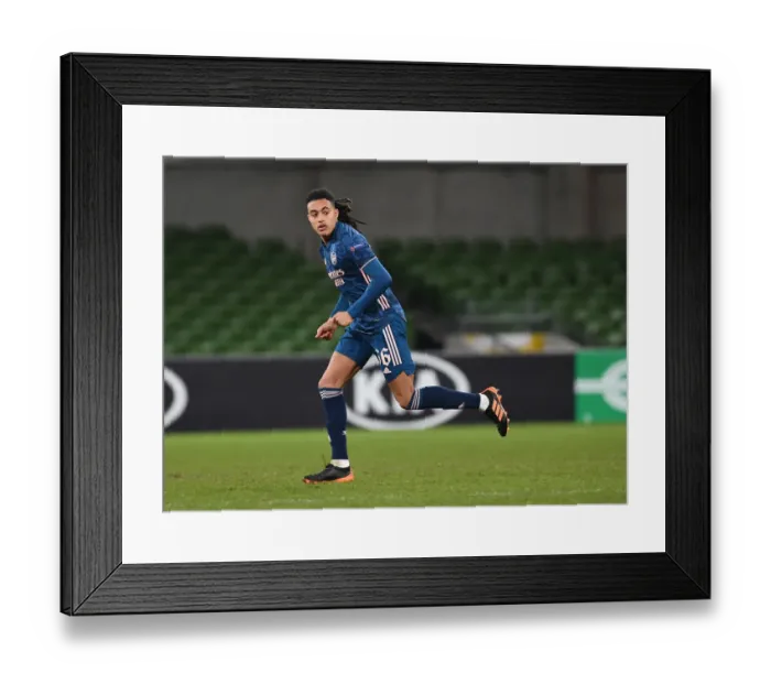 Framed Print : Arsenal's Miguel Azeez Steals the Show: A Standout Performance in Europa League Victory over Dundalk