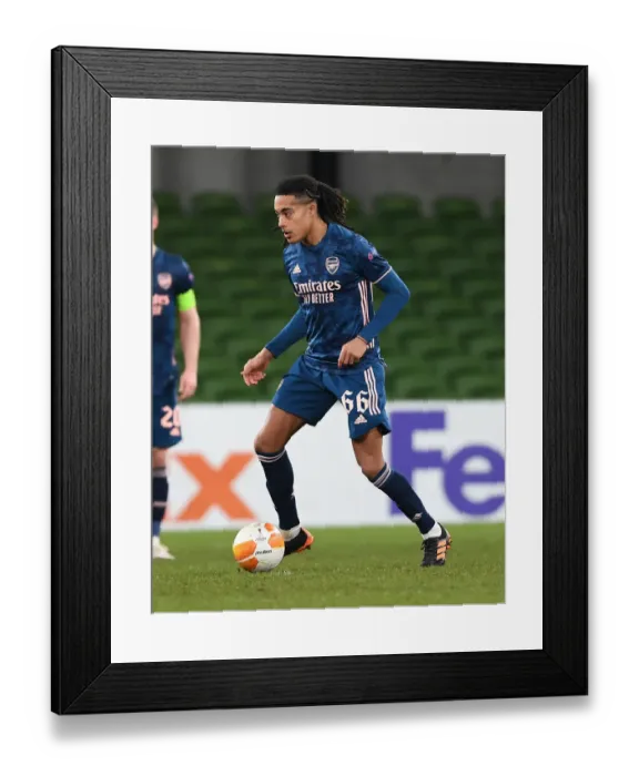 Framed Print : Miguel Azeez in Action: Arsenal's Rising Star Shines in Europa League Clash against Dundalk