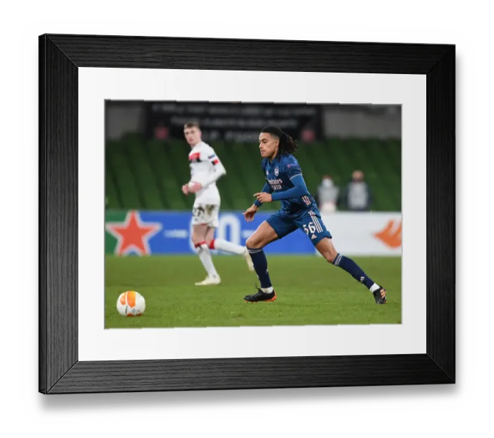 Framed Print : Miguel Azeez Shines: Arsenal's Europa League Victory Over Dundalk Framed Print : Miguel Azeez Shines: Arsenal's Europa League Victory Over Dundalk