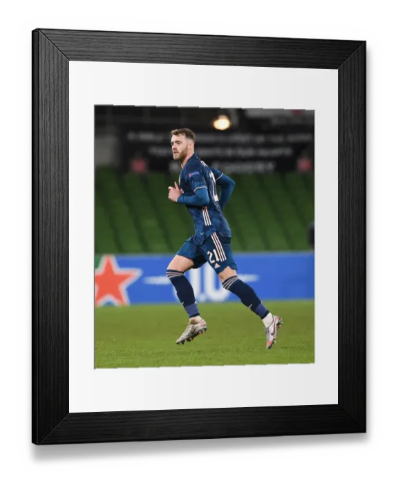 Framed Print : Calum Chambers Standout Performance: Arsenal's Defender in Action against Dundalk in Europa League Framed Print : Calum Chambers Standout Performance: Arsenal's Defender in Action against Dundalk in Europa League