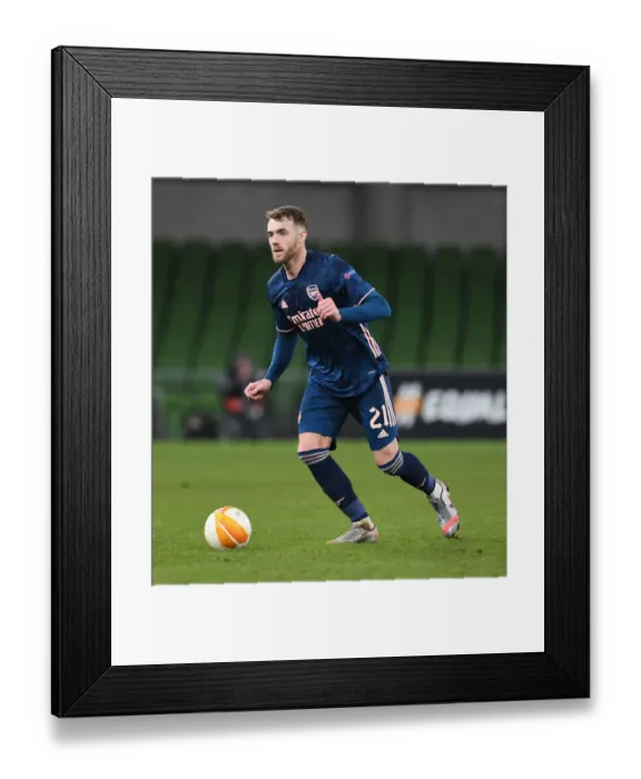 Framed Print : Arsenal's Calum Chambers in Action against Dundalk in UEFA Europa League