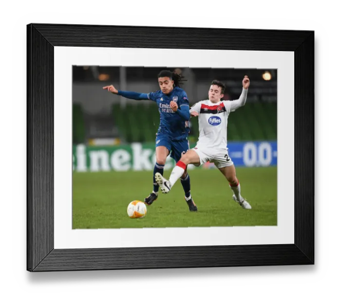 Framed Print : Arsenal's Miguel Azeez Outshines Dundalk's James Wynne: Europa League Clash Highlights
