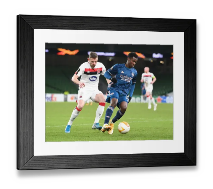 Framed Print : Arsenal's Eddie Nketiah Clashes with Dundalk's Andy Boyle in UEFA Europa League Showdown