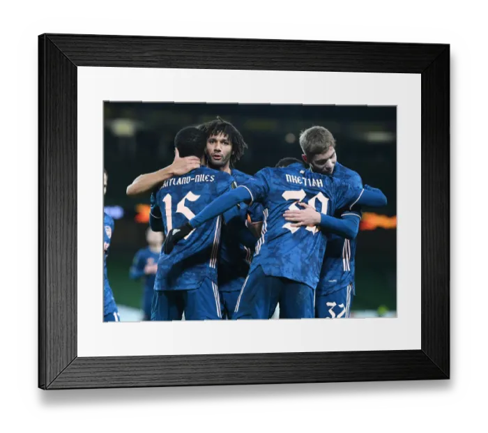 Framed Print : Arsenal Celebrate First Goal Against Dundalk in Europa League Framed Print : Arsenal Celebrate First Goal Against Dundalk in Europa League