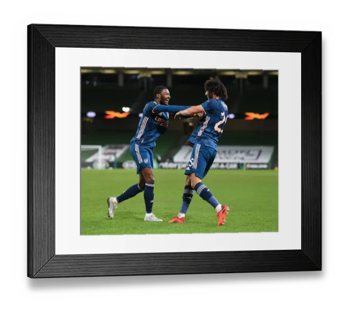 Framed Print : Arsenal's Elneny and Maitland-Niles Celebrate Goals in UEFA Europa League Match Against Dundalk