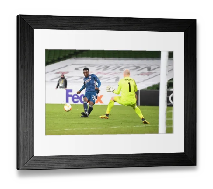 Framed Print : Arsenal Thrash Dundalk: Flo Balogun Scores Fourth in Europa League Victory
