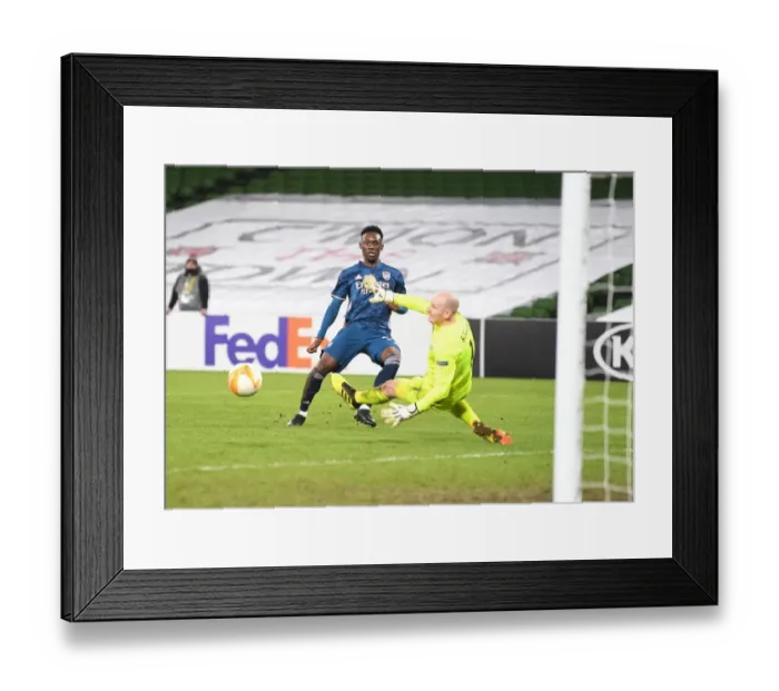 Framed Print : Arsenal Thrashes Dundalk: Flo Balogun Scores Fourth in Europa League Victory