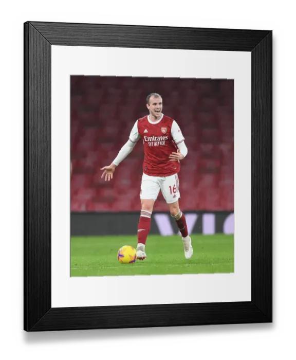 Framed Print : Arsenal vs Burnley: Rob Holding Amidst Limited Fan Presence in Premier League (December 2020) Framed Print : Arsenal vs Burnley: Rob Holding Amidst Limited Fan Presence in Premier League (December 2020)
