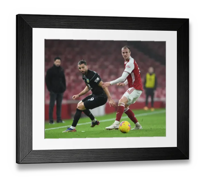 Framed Print : Arsenal vs Burnley: Rob Holding Clashes with Jay Rodriguez in Premier League Showdown at Emirates Stadium (Exclusive Image) Framed Print : Arsenal vs Burnley: Rob Holding Clashes with Jay Rodriguez in Premier League Showdown at Emirates Stadium (Exclusive Image)
