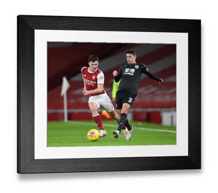 Framed Print : Arsenal's Kieran Tierney Outwits Matthew Lowton: Premier League Masterclass at Emirates Stadium Framed Print : Arsenal's Kieran Tierney Outwits Matthew Lowton: Premier League Masterclass at Emirates Stadium