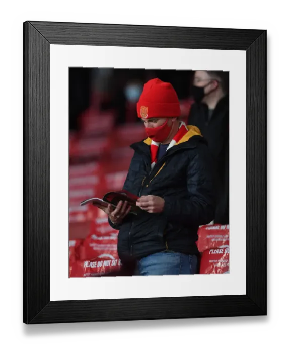 Framed Print : Arsenal Fan's Anticipation: Arsenal v Burnley, Premier League, Emirates Stadium