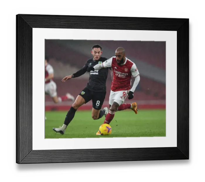 Framed Print : Arsenal vs Burnley: Lacazette Clashes with Brownhill in Premier League Showdown