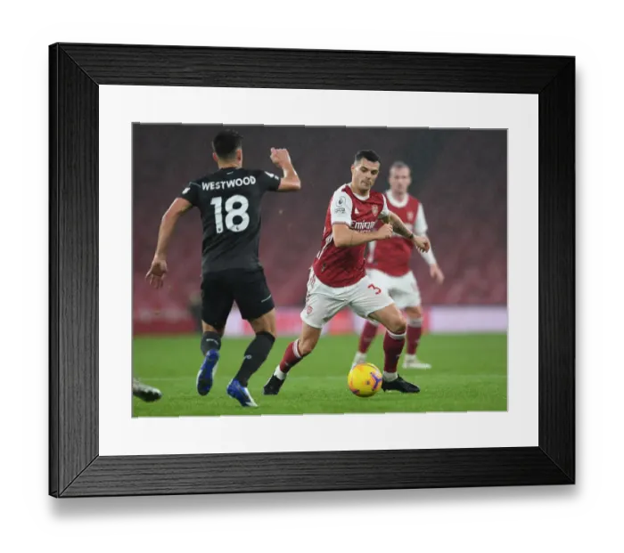 Framed Print : Arsenal vs Burnley: Xhaka vs Westwood Clash in Premier League Showdown