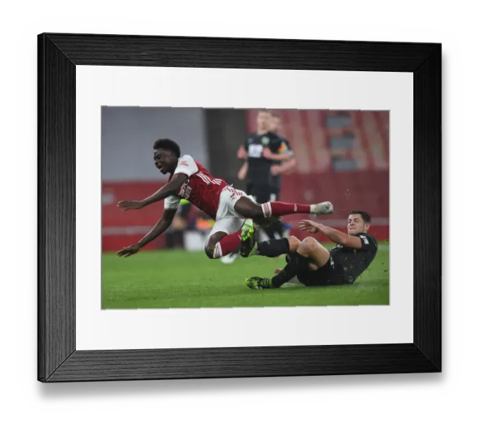 Framed Print : Saka vs Tarkowski: A Premier League Showdown at Emirates Stadium Framed Print : Saka vs Tarkowski: A Premier League Showdown at Emirates Stadium