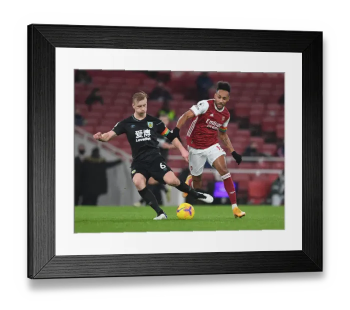 Framed Print : Arsenal's Aubameyang Closes In on Burnley's Mee in Premier League Showdown