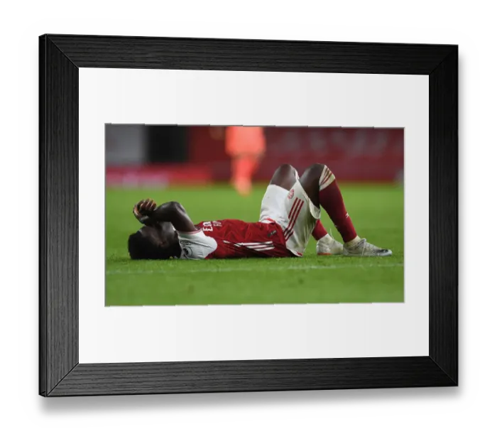 Framed Print : Arsenal's Bukayo Saka Celebrates Victory Over Burnley in Premier League