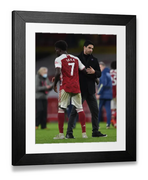 Framed Print : Arsenal Manager Mikel Arteta Celebrates with Bukayo Saka after Arsenal's Victory over Burnley (2020-21)