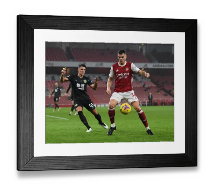 Framed Print : Arsenal vs Burnley: Xhaka Under Pressure in Premier League Clash