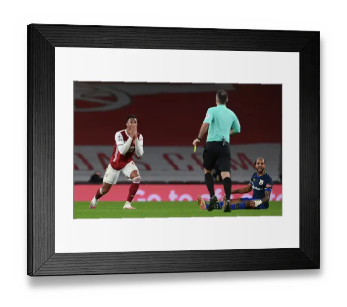 Framed Print : Arsenal vs Southampton: Gabriel Magalhaes Contemplates Referees Decision