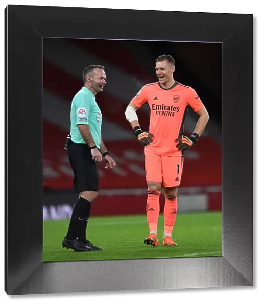 Arsenal's Bernd Leno Shares a Light-Hearted Moment with Referee Paul Tierney During Arsenal v Southampton Match, Premier League 2020-21