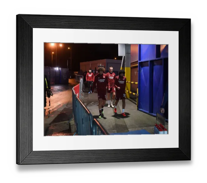 Framed Print : Arsenal Players Prepare for Everton Clash: Warm-Up at Goodison Park