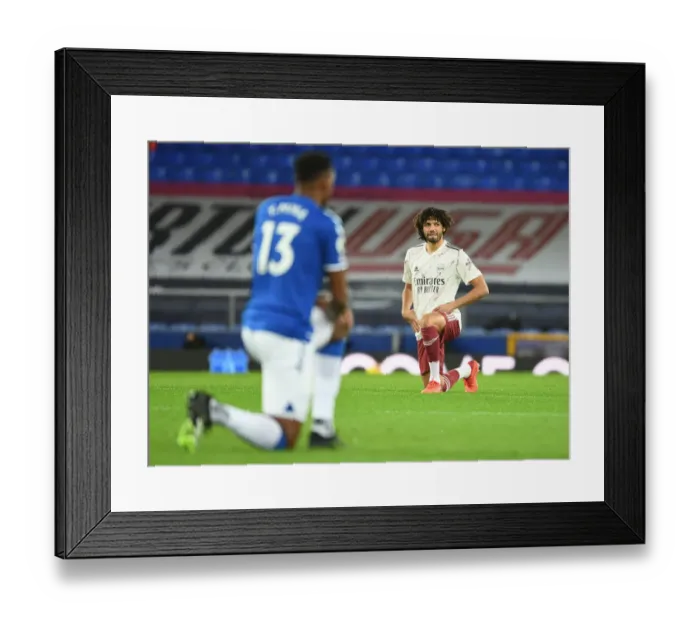 Framed Print : Arsenal's Mo Elneny Kneels Before Everton Match, Premier League 2020-21 Framed Print : Arsenal's Mo Elneny Kneels Before Everton Match, Premier League 2020-21