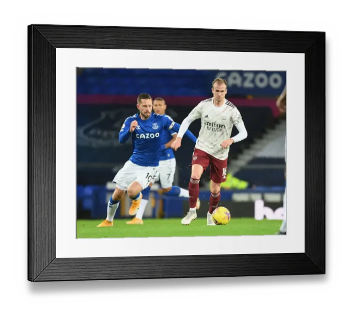 Framed Print : Rising Above: Rob Holding Battles Past Gylfi Sigurdsson in Everton vs Arsenal Premier League Clash Framed Print : Rising Above: Rob Holding Battles Past Gylfi Sigurdsson in Everton vs Arsenal Premier League Clash