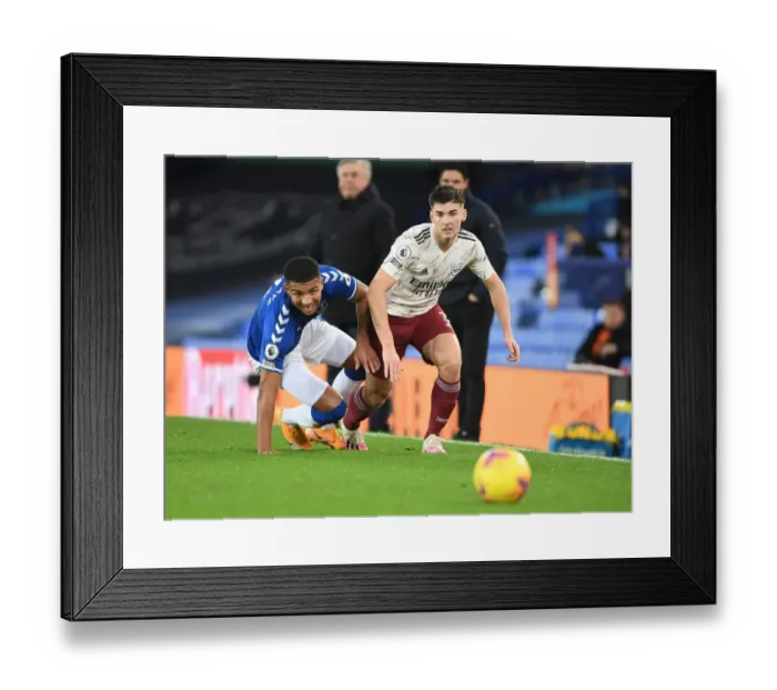Framed Print : Clash at Goodison Park: Kieran Tierney vs Mason Holgate in the Premier League Battle between Everton and Arsenal Framed Print : Clash at Goodison Park: Kieran Tierney vs Mason Holgate in the Premier League Battle between Everton and Arsenal
