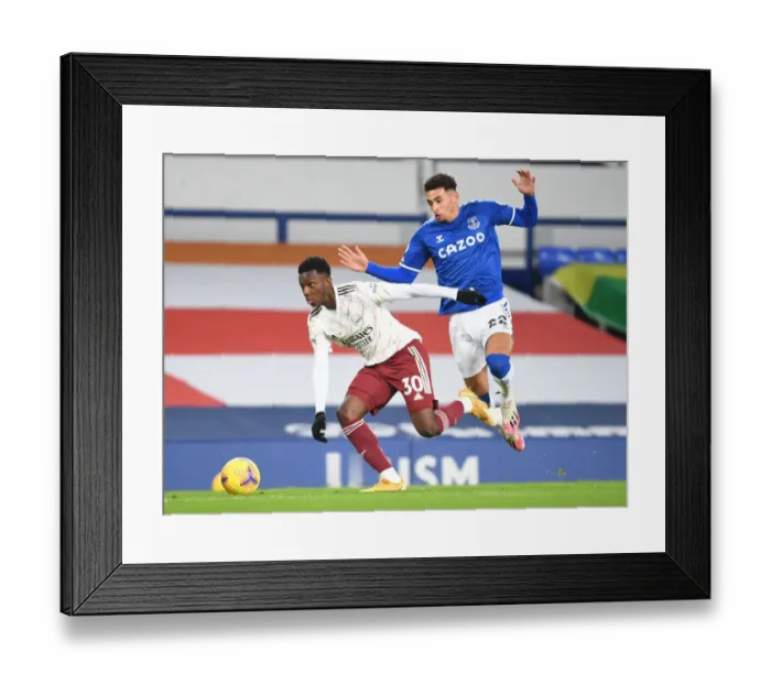 Framed Print : Arsenal's Eddie Nketiah Dashes Past Everton's Ben Godfrey in Premier League Clash (Everton v Arsenal 2020-21)