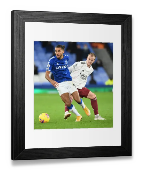 Framed Print : Rivalry Renewed: Holding vs Calvert-Lewin in Everton vs Arsenal Premier League Clash