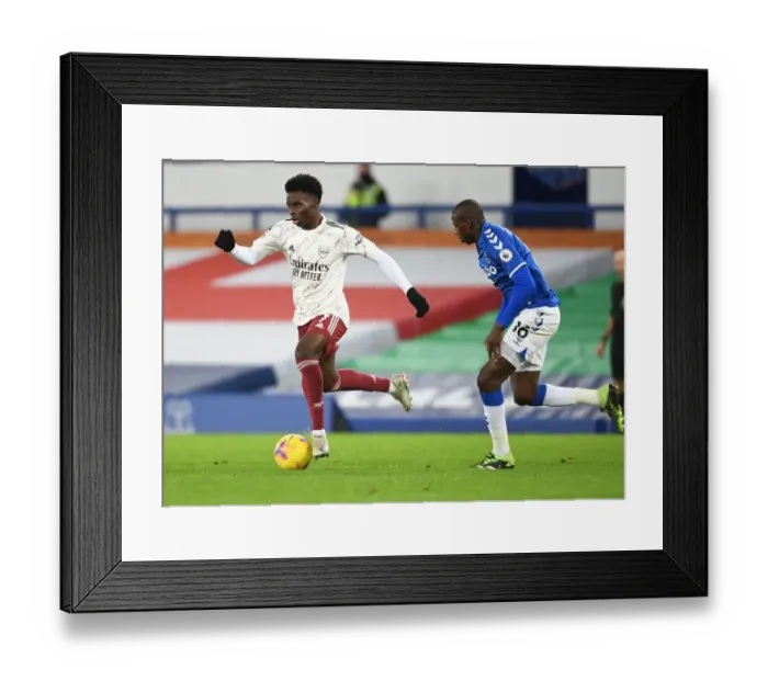 Framed Print : Bukayo Saka Dashes Past Everton's Yerry Mina: Everton vs Arsenal, Premier League 2020-21 Framed Print : Bukayo Saka Dashes Past Everton's Yerry Mina: Everton vs Arsenal, Premier League 2020-21